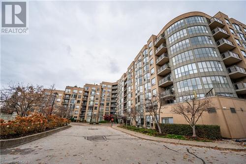 View of building exterior - 2511 Lakeshore Road W Unit# 108, Oakville, ON - Outdoor With Facade