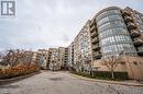 View of building exterior - 2511 Lakeshore Road W Unit# 108, Oakville, ON  - Outdoor With Facade 