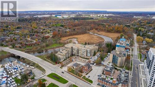 Birds eye view of property with a water view - 2511 Lakeshore Road W Unit# 108, Oakville, ON - Outdoor With View