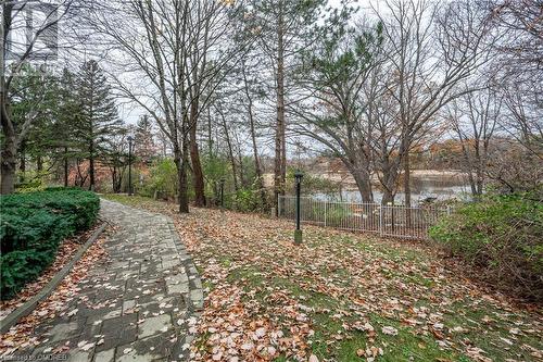 View of yard featuring a water view - 2511 Lakeshore Road W Unit# 108, Oakville, ON - Outdoor With View