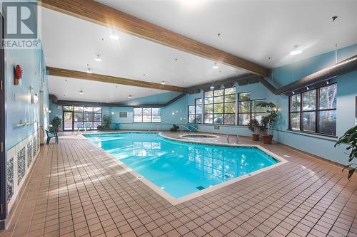 122 1080 Resort Dr, Parksville, BC - Indoor Photo Showing Other Room With In Ground Pool