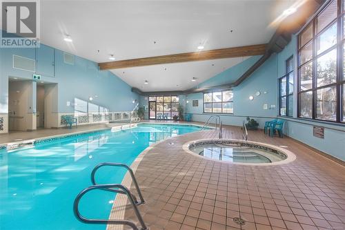 122 1080 Resort Dr, Parksville, BC - Indoor Photo Showing Other Room With In Ground Pool