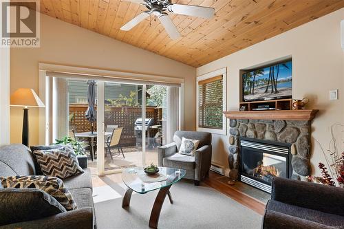 122 1080 Resort Dr, Parksville, BC - Indoor Photo Showing Living Room With Fireplace