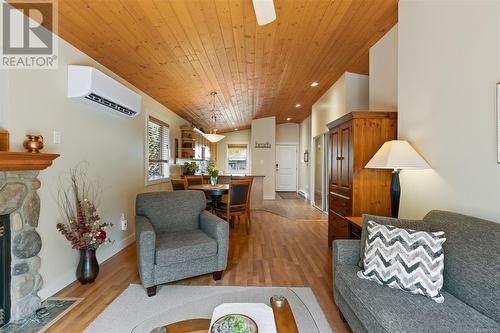 122 1080 Resort Dr, Parksville, BC - Indoor Photo Showing Living Room With Fireplace