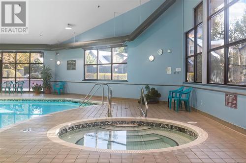 122 1080 Resort Dr, Parksville, BC - Indoor Photo Showing Other Room With In Ground Pool