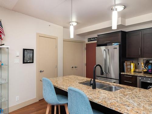 S204-737 Humboldt St, Victoria, BC - Indoor Photo Showing Kitchen With Stainless Steel Kitchen With Double Sink