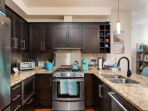 S204-737 Humboldt St, Victoria, BC - Indoor Photo Showing Kitchen With Stainless Steel Kitchen With Double Sink