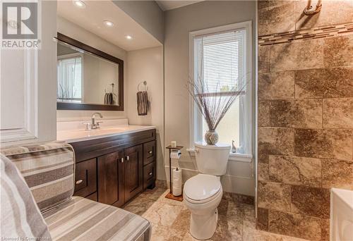 Bathroom featuring plenty of natural light, vanity, and toilet - 52 Adam Street, Cambridge, ON - Indoor Photo Showing Bathroom