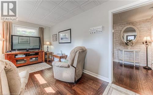 Sitting room with wood-type flooring - 52 Adam Street, Cambridge, ON - Indoor Photo Showing Living Room