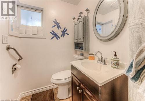 Bathroom featuring tile patterned flooring, vanity, and toilet - 52 Adam Street, Cambridge, ON - Indoor Photo Showing Bathroom