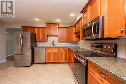 Main Unit Kitchen - Loads of Cabinet Space. - 1811-1813 50 Avenue, Vernon, BC - Indoor Photo Showing Kitchen With Stainless Steel Kitchen