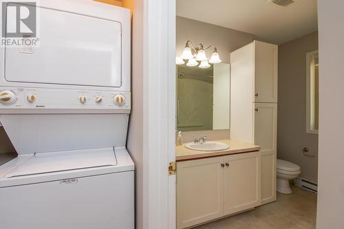 Main Unit Main Floor Laundry to 3 Piece Bath - 1811-1813 50 Avenue, Vernon, BC - Indoor Photo Showing Laundry Room