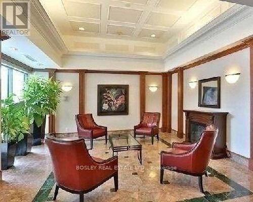 803 - 398 Eglinton Avenue E, Toronto, ON - Indoor Photo Showing Living Room With Fireplace