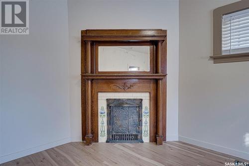 921 7Th Avenue N, Saskatoon, SK - Indoor Photo Showing Other Room With Fireplace