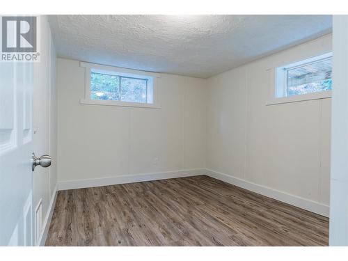 102 Campbell Road, Fruitvale, BC - Indoor Photo Showing Other Room