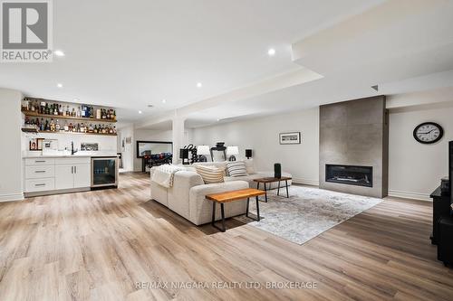 7 - 35 Scullers Way E, St. Catharines (438 - Port Dalhousie), ON - Indoor Photo Showing Living Room With Fireplace