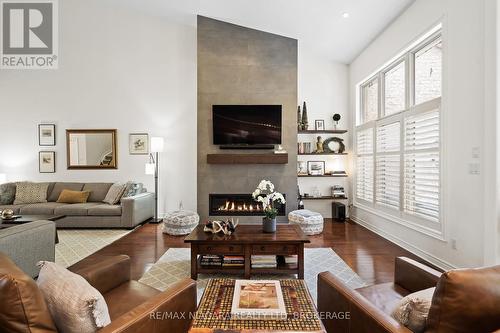 7 - 35 Scullers Way E, St. Catharines (438 - Port Dalhousie), ON - Indoor Photo Showing Living Room With Fireplace