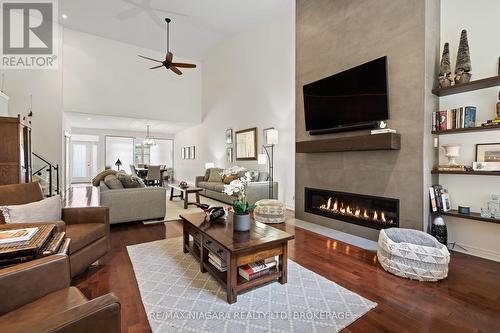 7 - 35 Scullers Way E, St. Catharines (438 - Port Dalhousie), ON - Indoor Photo Showing Living Room With Fireplace