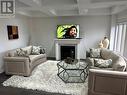 Upper - 105 Elephant Hill Drive, Clarington, ON  - Indoor Photo Showing Living Room With Fireplace 