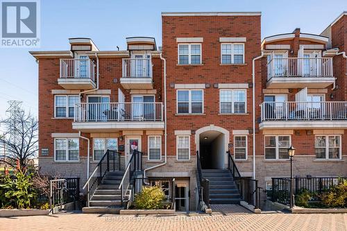 108 - 37 Four Winds Drive, Toronto, ON - Outdoor With Balcony With Facade