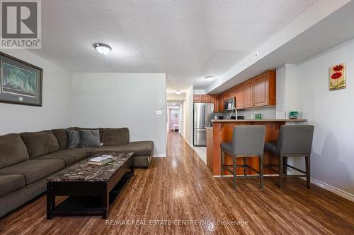 108 - 37 Four Winds Drive, Toronto, ON - Indoor Photo Showing Living Room