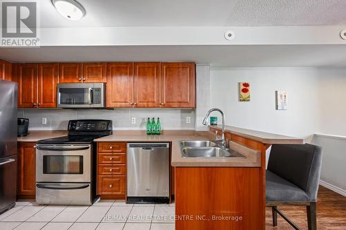 108 - 37 Four Winds Drive, Toronto, ON - Indoor Photo Showing Kitchen With Double Sink