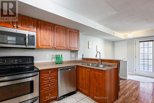 108 - 37 Four Winds Drive, Toronto, ON - Indoor Photo Showing Kitchen With Double Sink