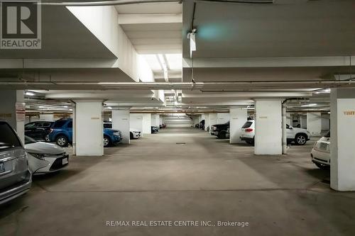 108 - 37 Four Winds Drive, Toronto, ON - Indoor Photo Showing Garage