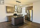 54 Matheson Crescent, East Zorra-Tavistock, ON  - Indoor Photo Showing Kitchen With Double Sink 