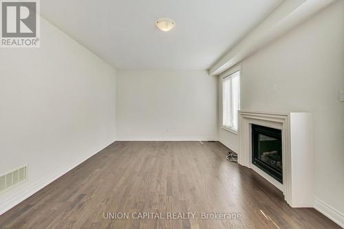 144 Mondial Crescent, East Gwillimbury, ON - Indoor Photo Showing Other Room With Fireplace