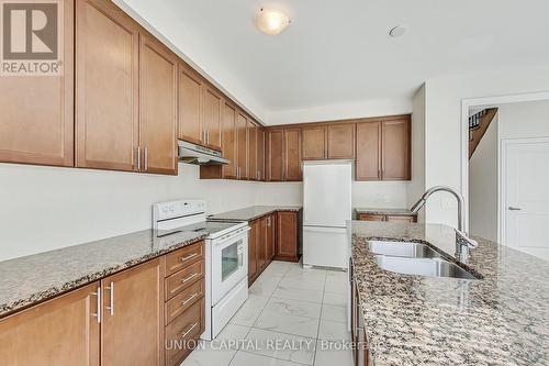 144 Mondial Crescent, East Gwillimbury, ON - Indoor Photo Showing Kitchen With Double Sink