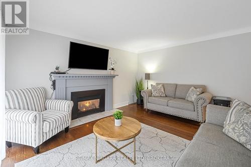 24 Brisbane Glen, St. Catharines (442 - Vine/Linwell), ON - Indoor Photo Showing Living Room With Fireplace