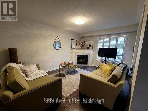 47 Milfoil Street, Halton Hills, ON - Indoor Photo Showing Living Room With Fireplace