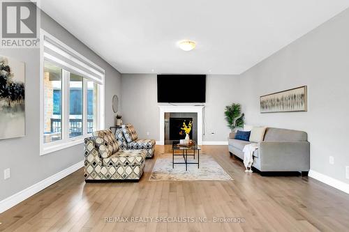 19 Ritchie Drive, East Luther Grand Valley, ON - Indoor Photo Showing Living Room With Fireplace