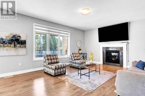 19 Ritchie Drive, East Luther Grand Valley, ON - Indoor Photo Showing Living Room With Fireplace