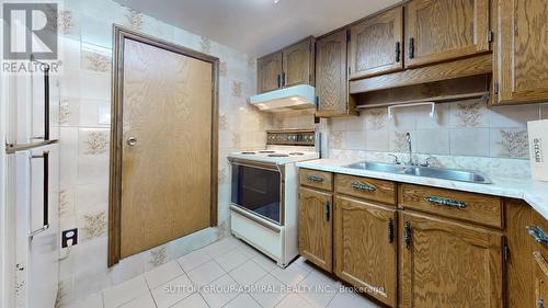 48 Dubray Avenue, Toronto, ON - Indoor Photo Showing Kitchen With Double Sink