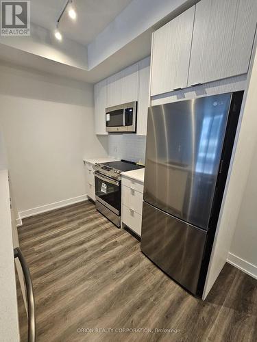 705 - 4130 Parkside Village Drive, Mississauga, ON - Indoor Photo Showing Kitchen With Stainless Steel Kitchen