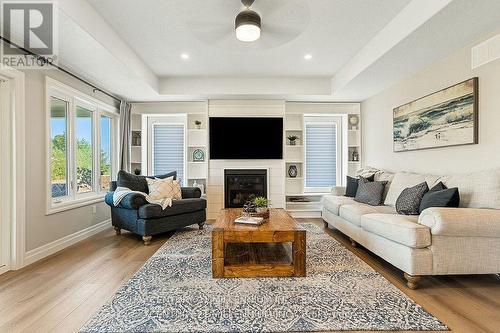 56 Mctavish Crescent, Huron-Kinloss, ON - Indoor Photo Showing Living Room With Fireplace