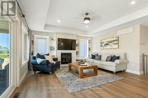 56 Mctavish Crescent, Huron-Kinloss, ON - Indoor Photo Showing Living Room With Fireplace