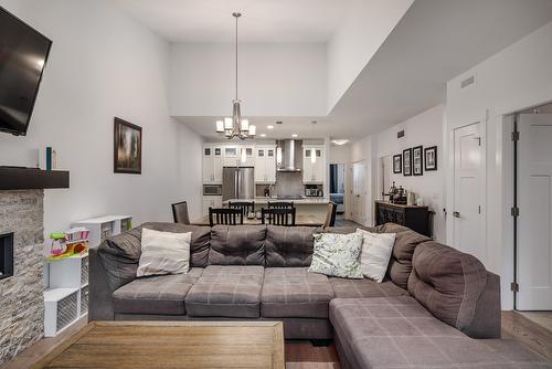 42-1870 Rosealee Lane, West Kelowna, BC - Indoor Photo Showing Living Room With Fireplace