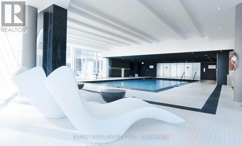 201 - 2916 Highway 7, Vaughan, ON - Indoor Photo Showing Other Room With In Ground Pool