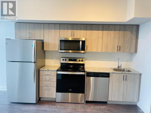 407 - 10 Meadowglen Place, Toronto, ON - Indoor Photo Showing Kitchen