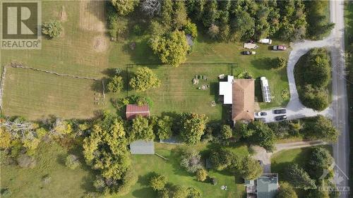 5.24 private acres with the perfect blend of sprawling lawns and mature trees. - 3161 Mackey Road, Manotick - Kars - Rideau Twp And Area (8008 - Rideau Twp S Of Reg Rd 6 W Of Mccordick Rd.), ON - Outdoor With View