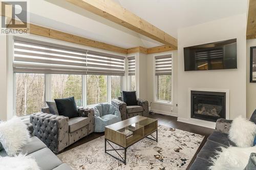 1020 Ridgeline Drive, Lake Of Bays, ON - Indoor Photo Showing Living Room With Fireplace