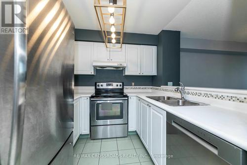 303 - 18 Pemberton Avenue, Toronto, ON - Indoor Photo Showing Kitchen With Double Sink