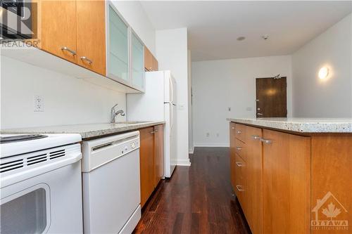 Spacious and modern, this condo offers a serene bedroom, quality-finished bathroom, and easy access to Ottawa's vibrant downtown life. - 383 Cumberland Street Unit#710, Ottawa, ON - Indoor Photo Showing Kitchen