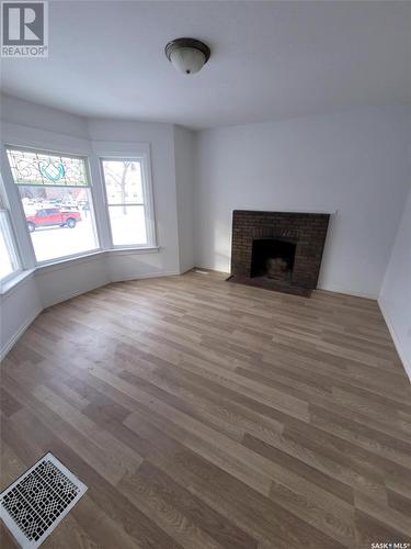 1282 103Rd Street, North Battleford, SK - Indoor Photo Showing Other Room With Fireplace