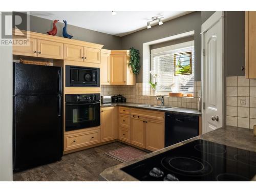 5901 Heritage Drive Unit# 14, Vernon, BC - Indoor Photo Showing Kitchen With Double Sink