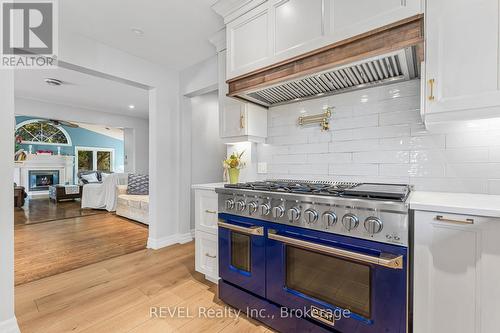 5 Cherryhill Drive, Grimsby (542 - Grimsby East), ON - Indoor Photo Showing Kitchen With Fireplace