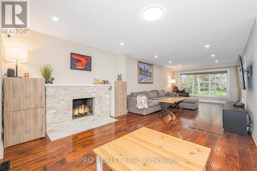 447 Edgeworth Road, Mississauga, ON - Indoor Photo Showing Living Room With Fireplace